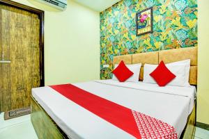 Hotel O Grace Villa में एक कमरे में एक या कई बेड