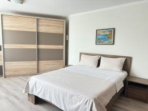 Кровать или кровати в номере Sea Garden 2BD