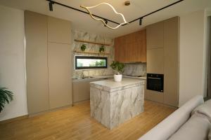 A kitchen or kitchenette at SanPietro Vacation Rentals