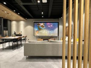 A television and/or entertainment centre at TABISAI HOTEL Lunon Tenjin