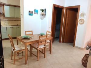 A kitchen or kitchenette at Casa I Colori Dell isola