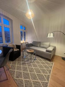 En sittgrupp på Zeitapartments Am Fischmarkt