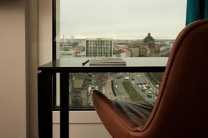 Area tempat duduk di The Cloud One Nürnberg, by the Motel One Group