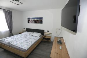 Cama ou camas em um quarto em Ferienwohnung Sölkner