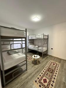 Кровать или кровати в номере Hostel Leon