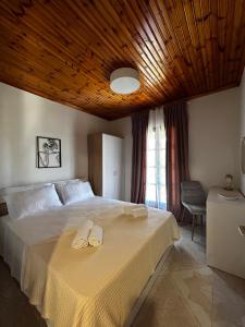 Tempat tidur dalam kamar di Small Paradise Perfect Hospitality