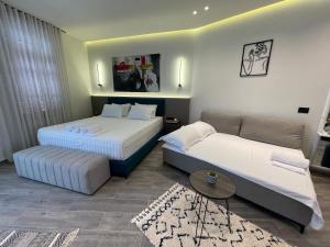 Кровать или кровати в номере The cosy inn vlora