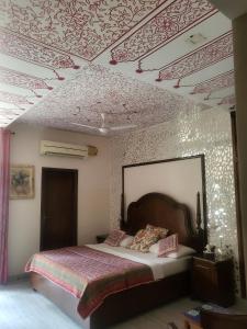 All Seasons Homestay में एक कमरे में एक या कई बेड