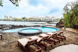 Sundlaugin á Hotel Villa Escalesia Galapagos eða í nágrenninu