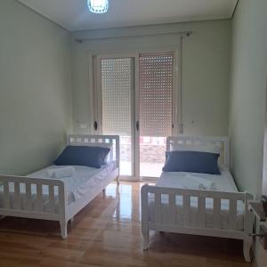 Tempat tidur dalam kamar di Dors Apartment