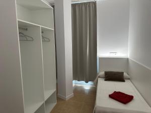 Krevet ili kreveti u jedinici u objektu Albergue O Pedrón Hostel & Rooms