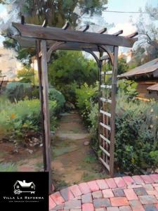 a painting of a garden with a wooden gate at Villa La Reforma - Newly Designed 4BR HOUSE & POOL in Los Angeles by Topanga in Los Angeles