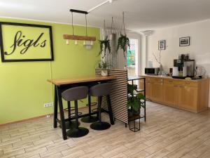 Una cocina o kitchenette en Das Sigl's