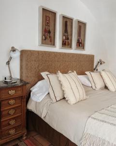 เตียงในห้องที่ El Cortijo Hotel Boutique