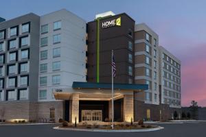 eine Darstellung der Vorderseite eines Hotels in der Unterkunft Home2 Suites By Hilton Durham University Medical Center in Durham