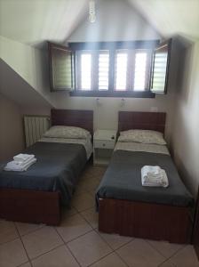 Una cama o camas en una habitación de Tenuta Vitale - Azienda agricola multifunzionale