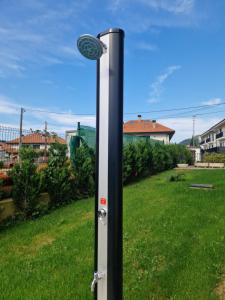 a pole with a light on a field of grass at Casa La Quintana in Castro-Urdiales