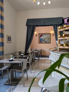 Кът за сядане в Hotel Soggiorno Athena