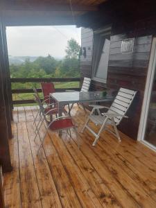 En balkon eller terrasse på Vikendica Planina Jelica,Guča