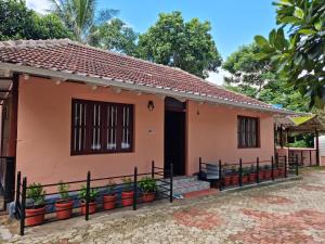 カルペッタにあるTranquil Cottage, Kalpetta, Wayanadの植物の家