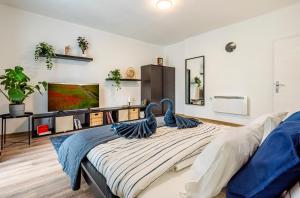 a bedroom with a large bed in a room at Riverside Apartment No1 in Esztergom