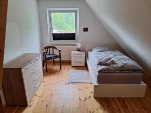 Llit o llits en una habitació de Bei Fränky