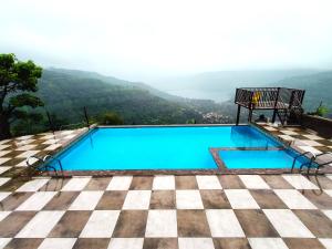 Bazen u objektu Vinayaka Holiday Homes - Infinity Pool and Breathtaking Valley View ili u blizini