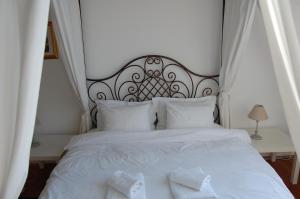 Postelja oz. postelje v sobi nastanitve Bucharest Boutique Accommodation by Hotels