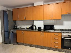 A kitchen or kitchenette at Vivienda Lanzarote