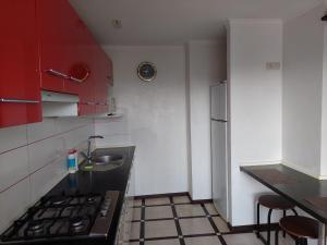 A kitchen or kitchenette at Apartment On Pribuzhskaya 2