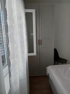 Postelja oz. postelje v sobi nastanitve Apartman Villeto