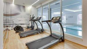 Posilňovňa alebo fitness centrum v ubytovaní Apartament Lustrzany Waterlane Island Spa Gdańsk