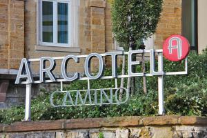 a sign that says emeraldcalining in front of a building at ARCOTEL Camino Stuttgart in Stuttgart