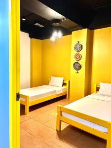 Posteľ alebo postele v izbe v ubytovaní Cheese Hostel Manila