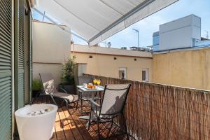 Aspasios Paseo de Gracia Apartments tesisinde bir balkon veya teras