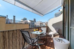 Aspasios Paseo de Gracia Apartments tesisinde bir balkon veya teras