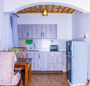 Virtuvė arba virtuvėlė apgyvendinimo įstaigoje OAK Homes Diani