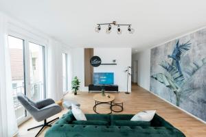 TV i/ili multimedijalni sistem u objektu koCASA-Apartments 02, Design, City-Center Böblingen, Stellplatz, Balkon, Waipu-Tv