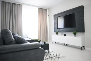 TV i/ili zabavni centar u objektu KARIMI Apartment - Grand Kristal Residence Bucuresti