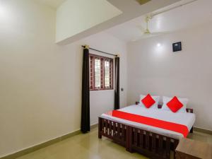 Hotel O Aiswarya Residency में एक कमरे में एक या कई बेड