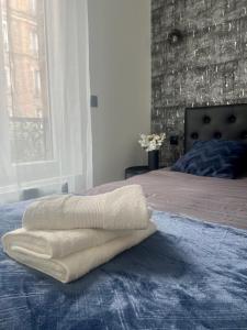 Cama ou camas em um quarto em Porte de Versailles - Appartement Charmant - Paris 15