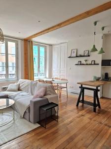 Ruang duduk di Magnifique Appartement - Driant