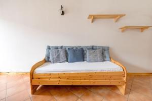 A bed or beds in a room at Dolomiti Skyview Duplex with private park -20' Cortina