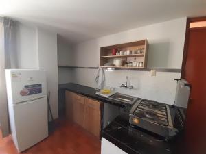 Una cocina o kitchenette en Apartamento con bonita vista Volcan