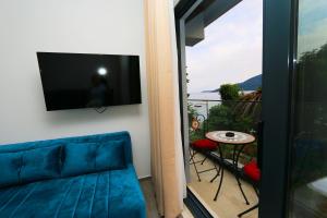 Televisi dan/atau pusat hiburan di Apartments Port View