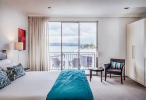 Ліжко або ліжка в номері Trinity Wharf Tauranga