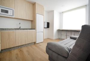 Кухня или кухненски бокс в Apartamentos Xiana