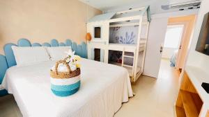 Una cama o camas en una habitación de D'Blue Búzios Hotel Boutique