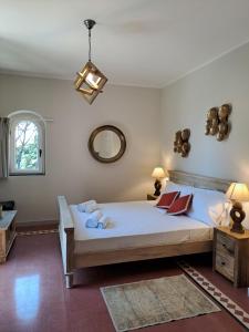 Cama ou camas em um quarto em Hero's Garden Relais