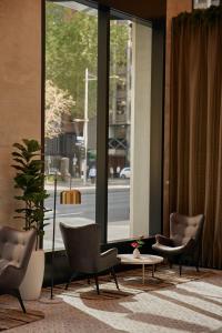 Гостиная зона в Meriton Suites Melbourne